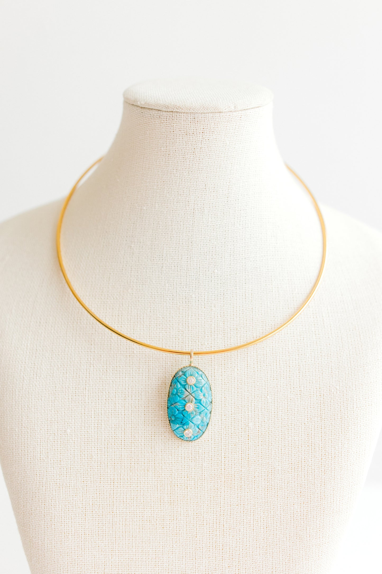 Carved Turquoise Pendant